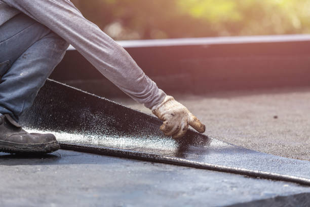 Professional Waterproofing technician working in Romulus, NY
